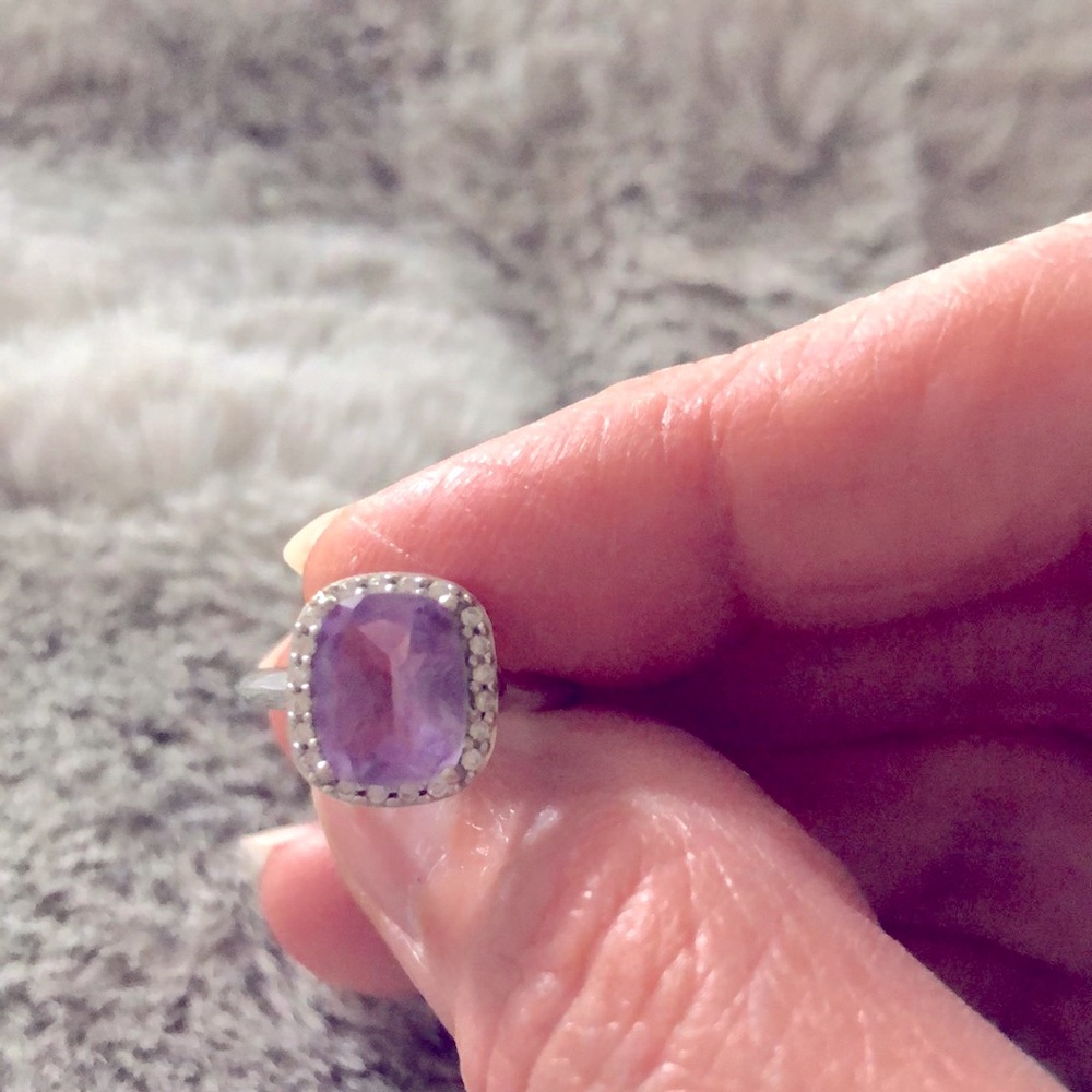 Silver and light purple stone